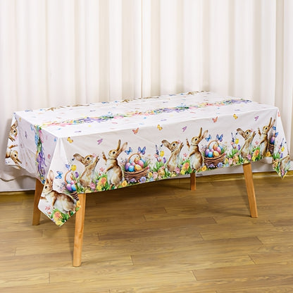 1 Stück festliche Tischdecke mit verspielten Motiven von Hasen, Ostereiern und Tulpen, Maße 130 x 220 cm. Diese Einweg-Kunststoff-Tischdecke in rechteckiger Form ist perfekt für Osterfeiern, Picknicks und heimisches Essen.