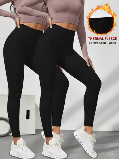 2er-Pack Damen-Leggings mit niedrigem Bund aus Fleece und Thermotechnologie. Für Winterlauf und Yoga konzipiert, hält während des Trainings warm
