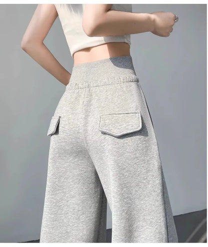 Damen graue Sporthose mit hohem Bund, locker hängend, schlank machend, gerade geschnittene weite Hose, amerikanische Jogginghose.