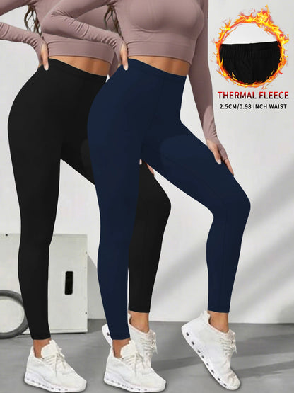 2er-Pack Damen-Leggings mit niedrigem Bund aus Fleece und Thermotechnologie. Für Winterlauf und Yoga konzipiert, hält während des Trainings warm