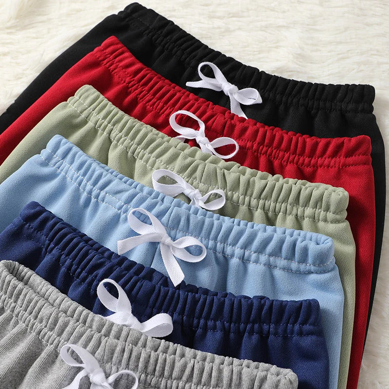 Kinder Mehrfarbige Saisonale Freizeit-Sporthose für Jungen und Mädchen Herbst Solide Farbe Modische Lockere Sweatpants