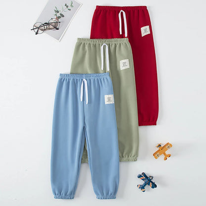Kinder Mehrfarbige Saisonale Freizeit-Sporthose für Jungen und Mädchen Herbst Solide Farbe Modische Lockere Sweatpants