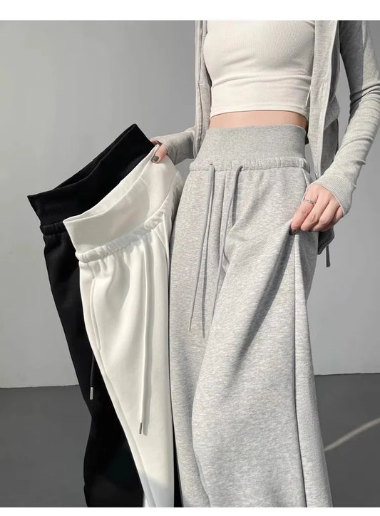 Damen graue Sporthose mit hohem Bund, locker hängend, schlank machend, gerade geschnittene weite Hose, amerikanische Jogginghose.