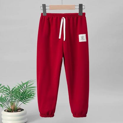 Kinder Mehrfarbige Saisonale Freizeit-Sporthose für Jungen und Mädchen Herbst Solide Farbe Modische Lockere Sweatpants