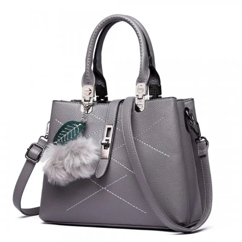 Miss Lulu Leder-Look Schultertasche mit Pom-Pom-Dekoration Stylische Handtasche für Damen Praktische Schultertasche